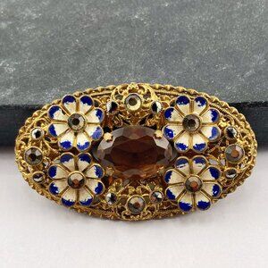ANTIQUE Brass floral filigree oval brooch with enamel and amber hued rhinestones